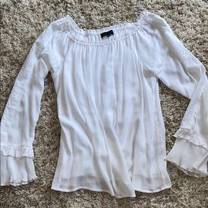 Flowy white top with lace detail on sleeve
